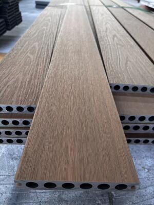 डब्ल्यूपीसी एंटीग्रीटास पैरा पिसीना वाई सुएलो बाहरी आउटडोर वाटरप्रूफ प्लास्टिक डेकिंग