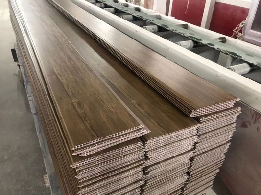 सजावटी लैमिनेट वुड PVC सीलिंग पैनल 25cm प्लास्टिक वॉल पैनल इंटीरियर